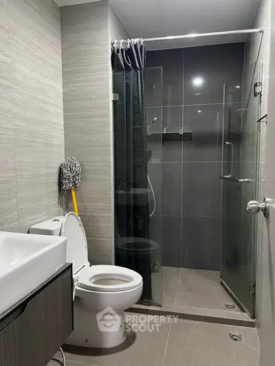 Modern bathroom with sleek design and glass shower enclosure