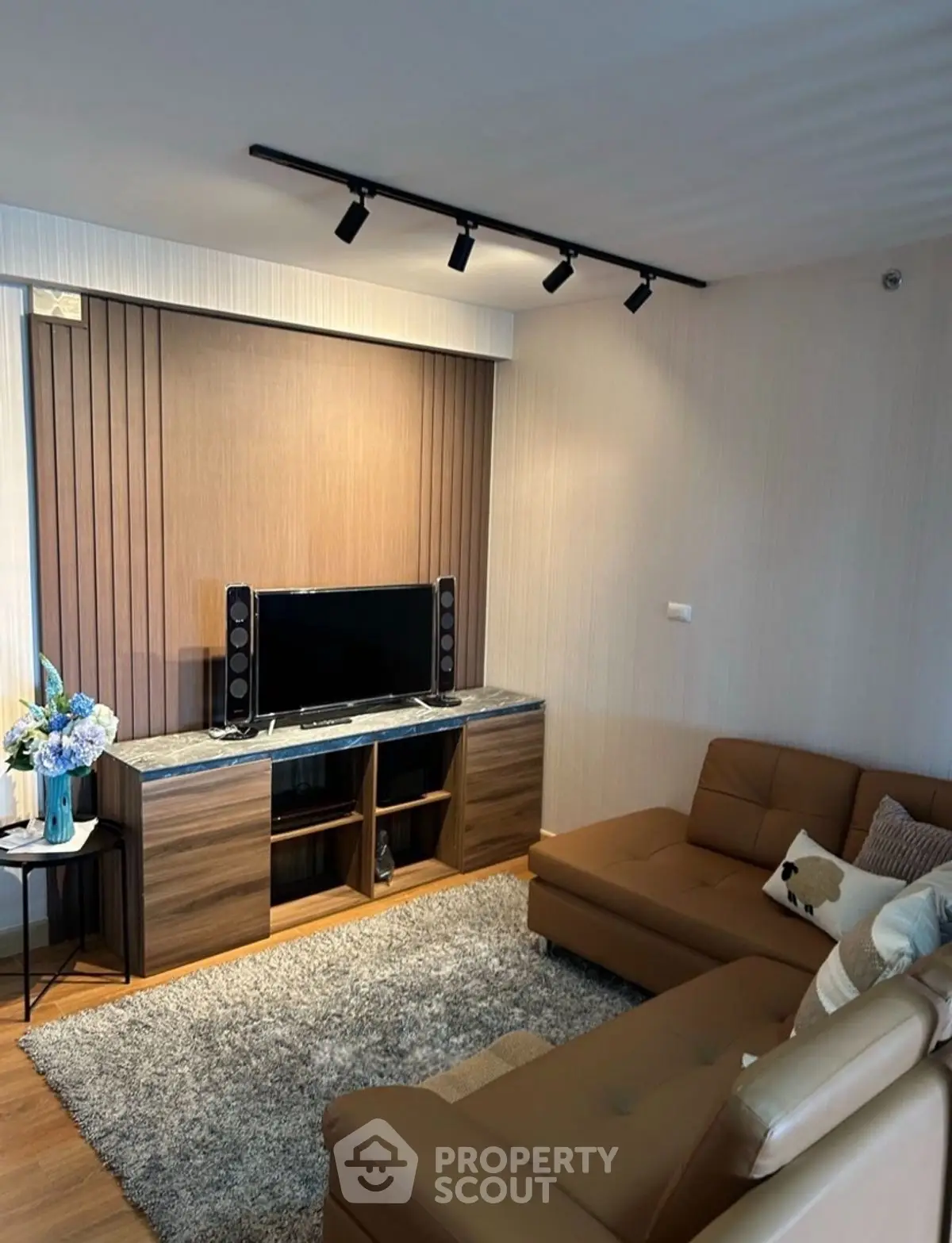 Modern living room with stylish furniture and cozy ambiance