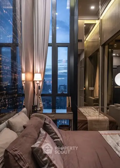 Luxurious bedroom with floor-to-ceiling windows and elegant decor