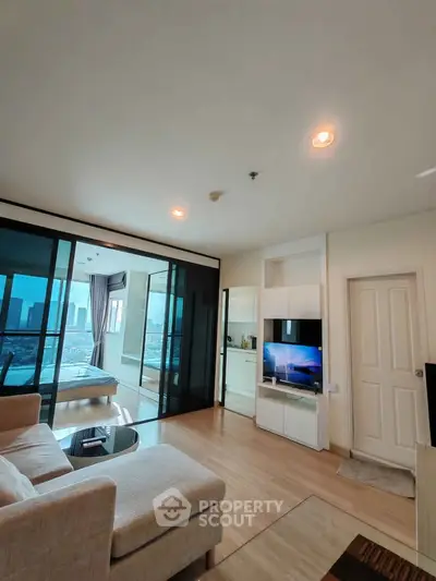 Modern living room with city view and cozy furnishings