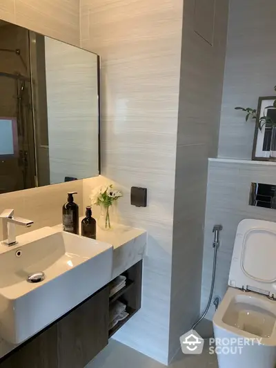 Modern bathroom with sleek sink and elegant decor