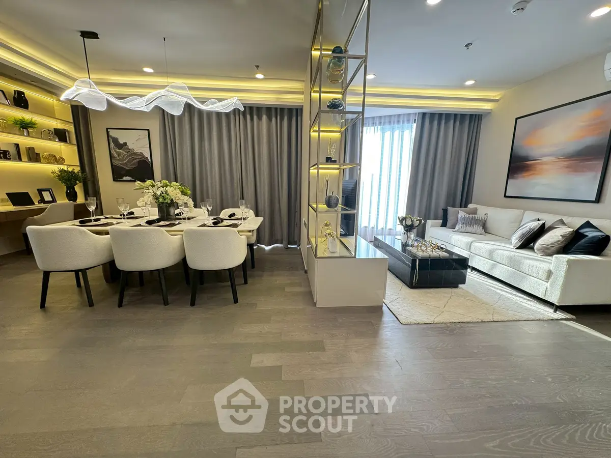 Luxurious living room with elegant dining area and modern decor