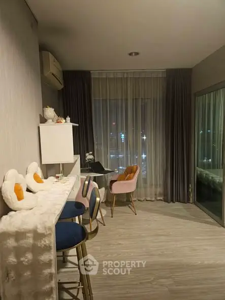 Cozy modern living room with stylish decor and city view