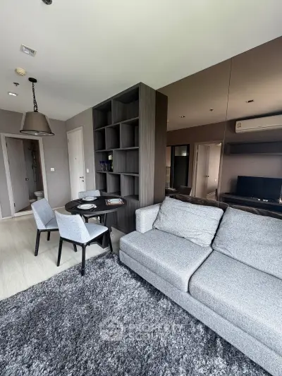 Modern living room with stylish furniture and open layout in a contemporary apartment.