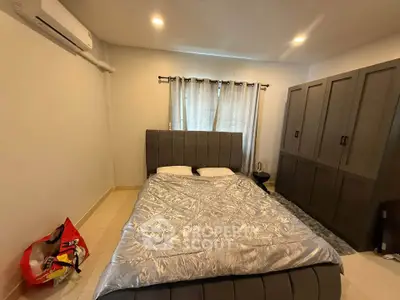 Cozy bedroom with modern design and ample storage space