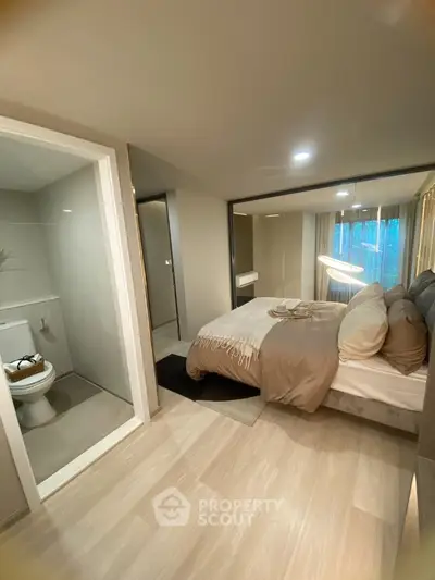 Modern bedroom with ensuite bathroom and stylish decor