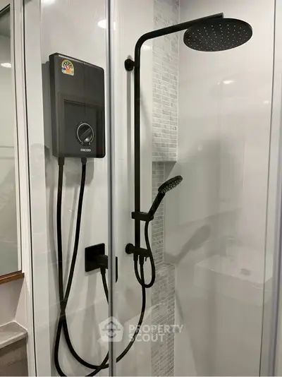 Modern bathroom with sleek showerhead and contemporary design