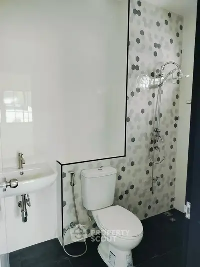 Modern bathroom with sleek fixtures and stylish tile design