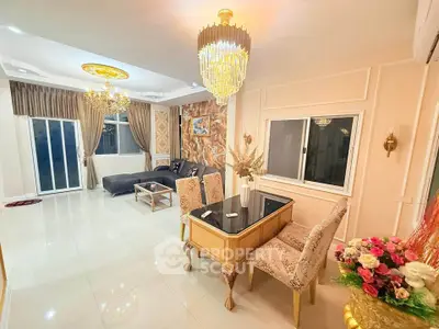 Luxurious living room with elegant chandeliers and stylish decor