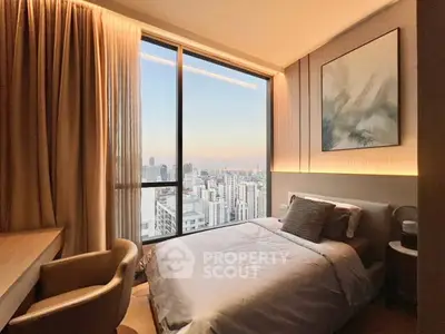 Modern bedroom with stunning city view, featuring cozy decor and large window for natural light.