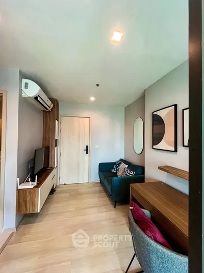 Modern living room with stylish decor and wooden flooring