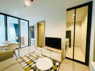 Modern living room with stylish decor and open layout in a contemporary apartment.