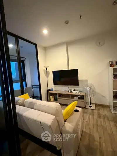 Cozy living room with modern decor and natural light