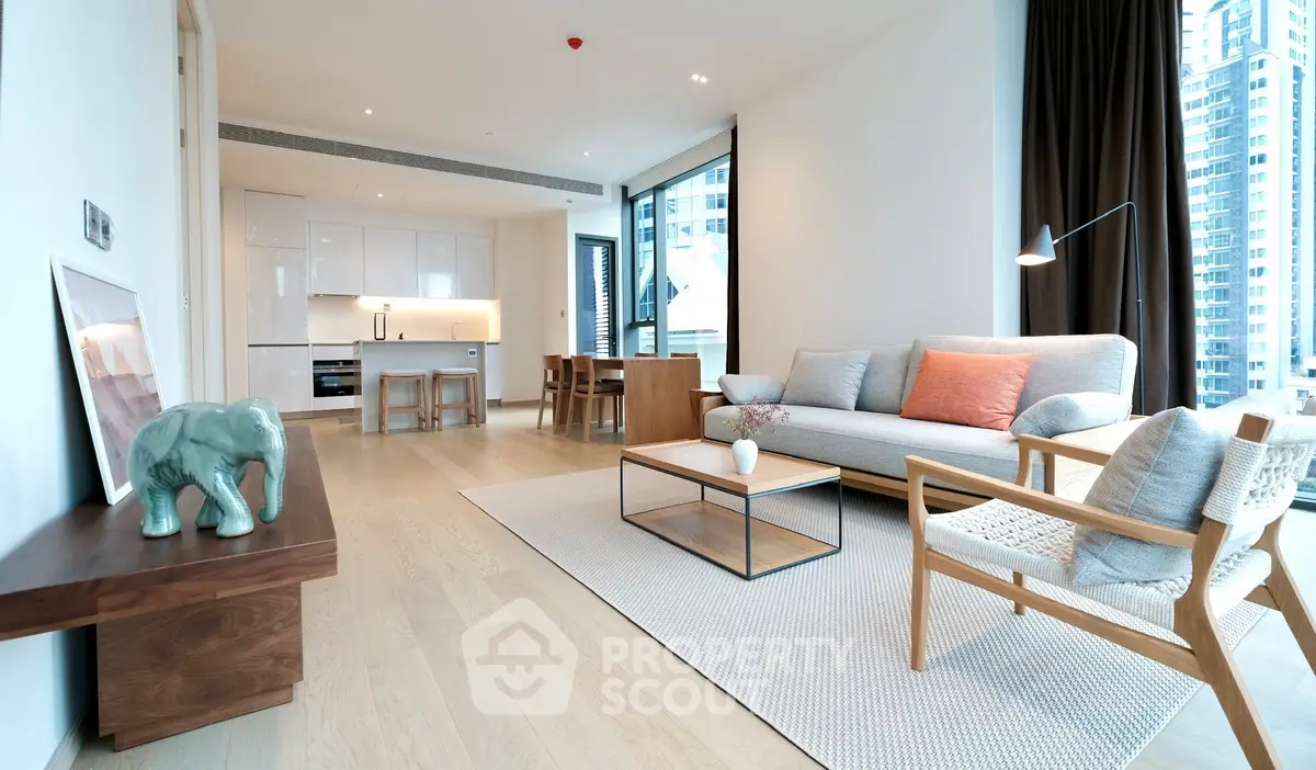 Modern open-plan living room with stylish decor and city view