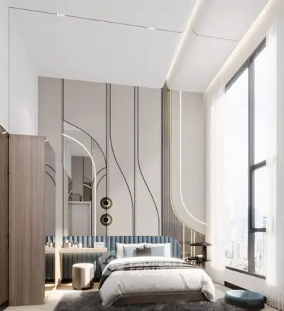 Luxurious bedroom with elegant modern design, featuring high ceilings, artistic wall details, and abundant natural light from large windows.