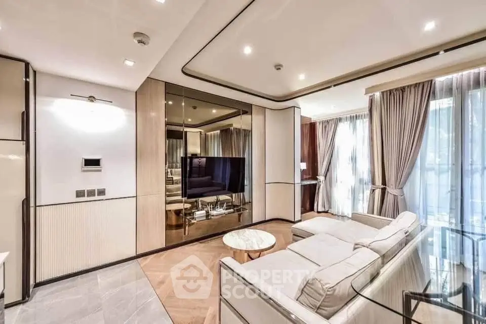 Luxurious modern living room with elegant decor and large windows for natural light.