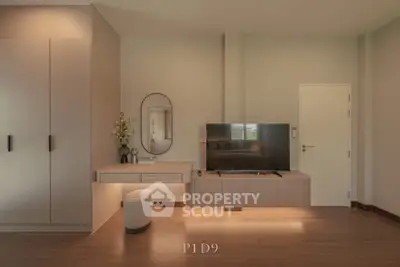 Modern living room with sleek TV unit and elegant decor