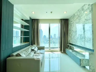 Luxurious living room with marble accent wall and city view balcony in modern apartment