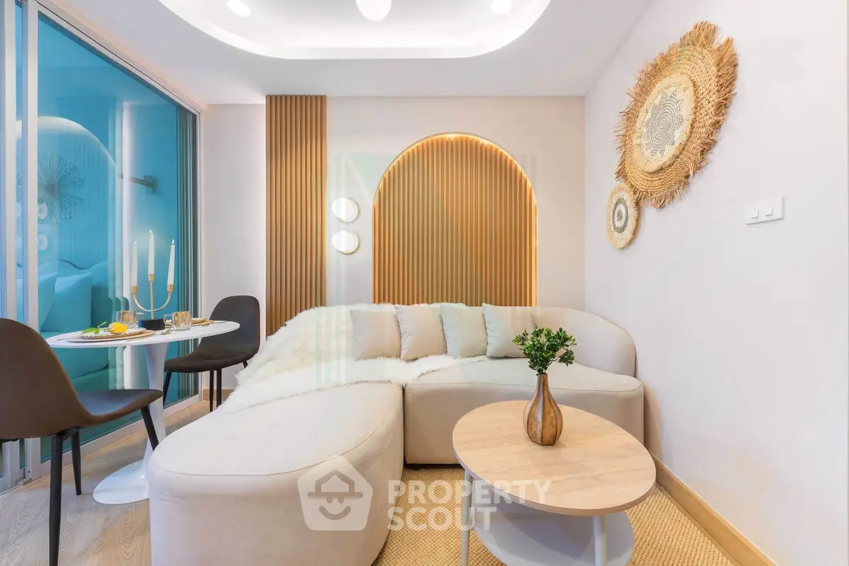 Stylish modern living room with cozy sectional sofa and elegant decor in a bright apartment.