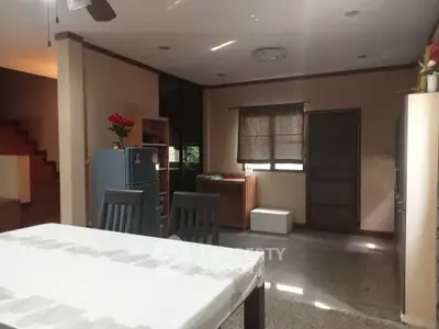 Spacious open-plan kitchen and dining area with natural light