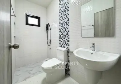 Modern bathroom with sleek fixtures and stylish tile design