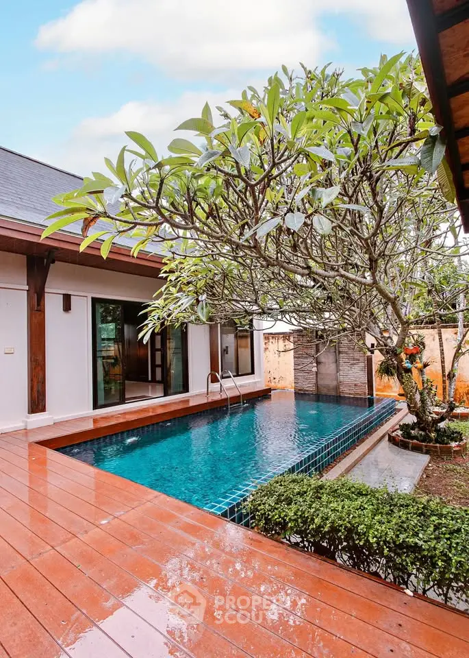 Luxurious villa with private pool and lush garden, perfect for relaxation and entertainment.