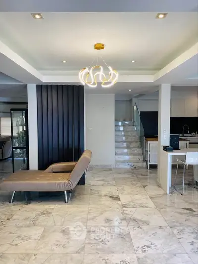 Luxurious modern living room with marble flooring and stylish lighting
