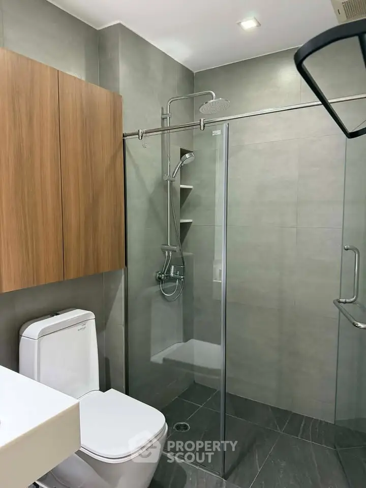 Modern bathroom with glass shower and sleek design