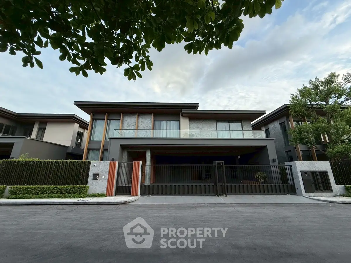 Modern luxury house exterior with sleek design and lush greenery