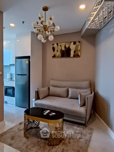 Modern living room with elegant decor and stylish lighting in a contemporary apartment.