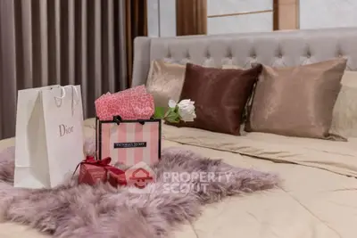 Luxurious bedroom with plush bedding and elegant decor, perfect for relaxation and comfort.