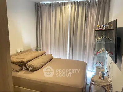 Cozy bedroom with modern decor and natural light