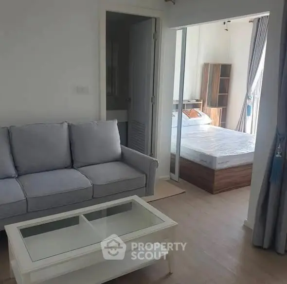 Modern apartment interior with cozy living room and stylish bedroom