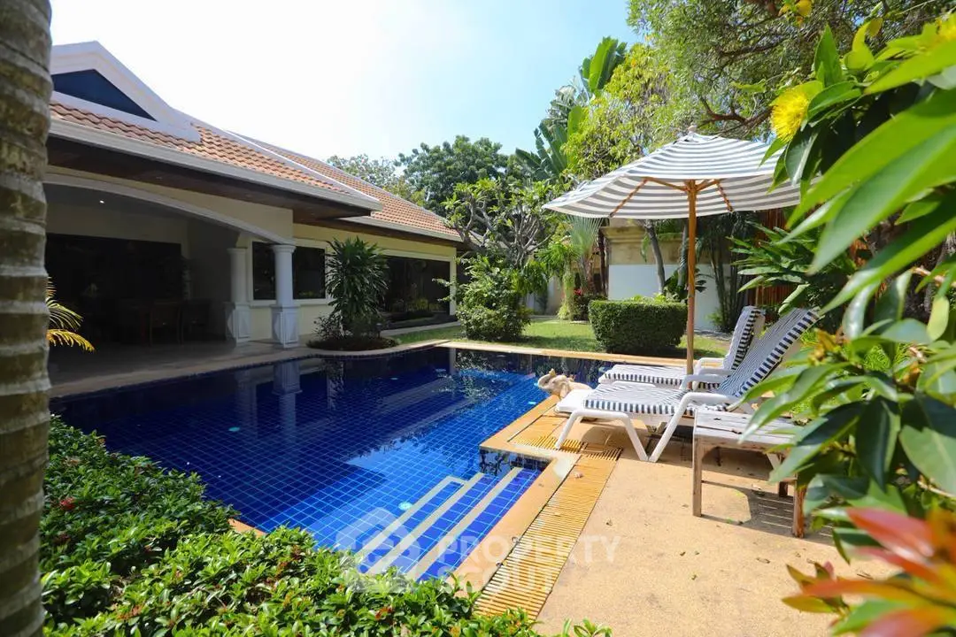 Luxurious villa with private pool and lush garden, perfect for relaxation and entertaining.