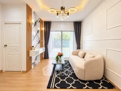 Modern living room with elegant decor and large window view