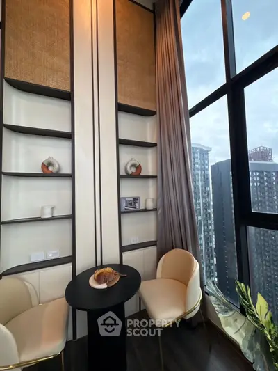 Stylish modern living room with floor-to-ceiling windows and city view