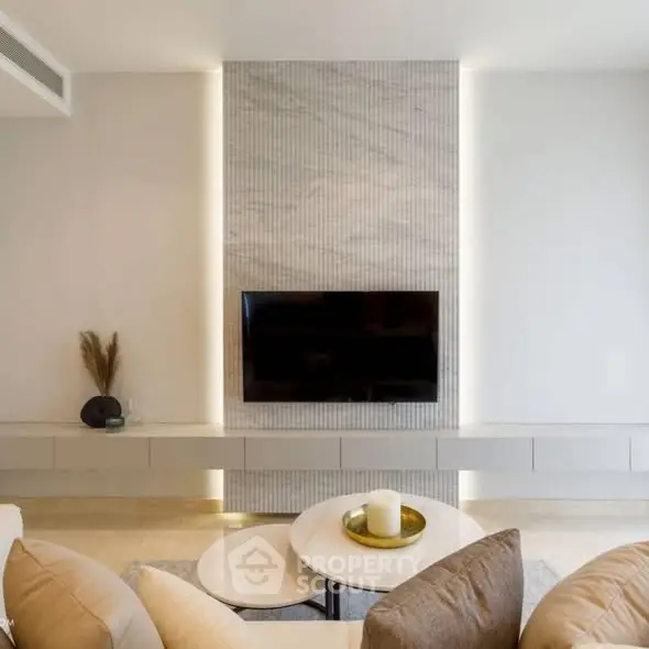 Modern living room with sleek TV setup and elegant decor