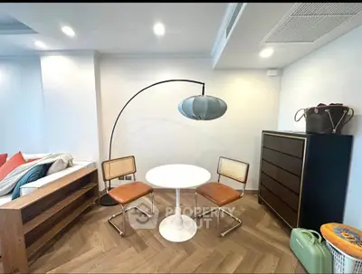 Chic modern living area with stylish furniture and elegant lighting