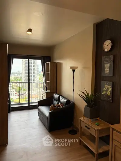 Modern living room with balcony view in urban apartment