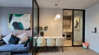 Modern living room with stylish decor and open dining area