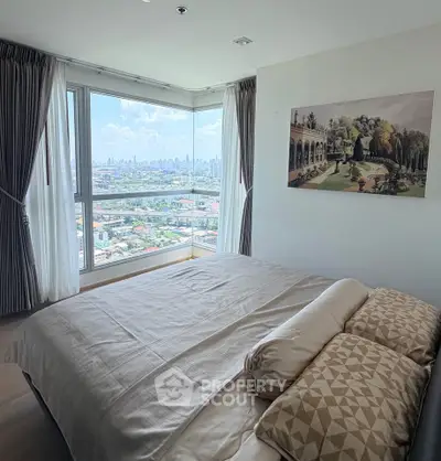 Luxurious bedroom with panoramic city view and elegant decor