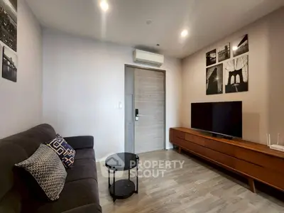 Modern living room with sleek furniture and stylish decor