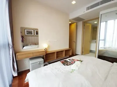 Modern bedroom with elegant decor and natural light