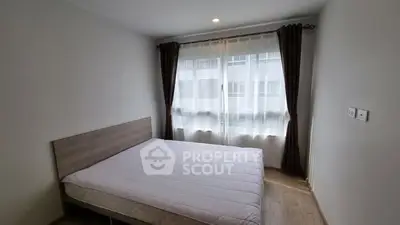 Cozy bedroom with natural light and modern design