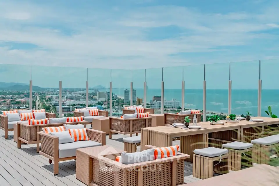 Stunning rooftop terrace with panoramic ocean views and stylish outdoor seating.