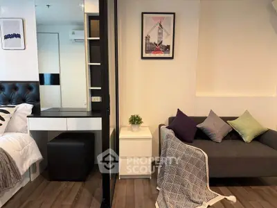 Modern studio apartment with stylish decor and cozy living area
