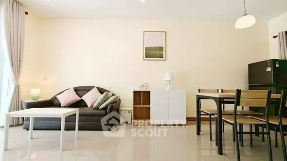 Spacious living room with modern furniture and natural light