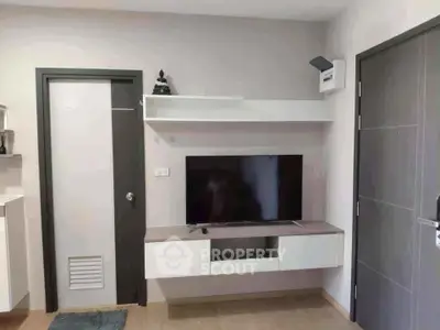 Modern living room with sleek TV unit and minimalist decor