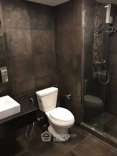 Modern bathroom with sleek design and glass shower enclosure