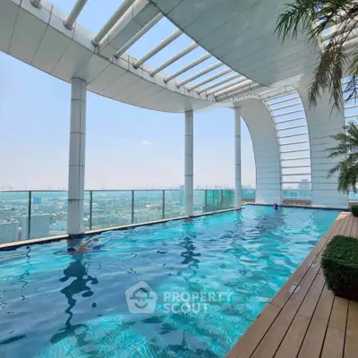 Luxurious rooftop pool with stunning city views and modern architectural design.